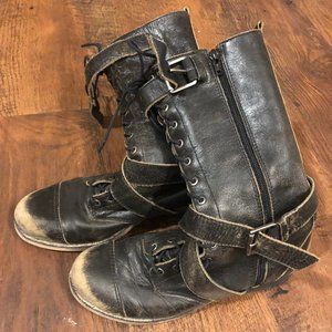 Distressed black leather boots